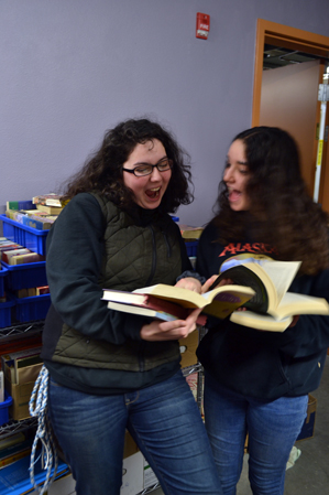 A couple from Deb's crew checking out a book